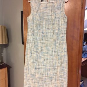 Mid length summer shift. Dry clean only.